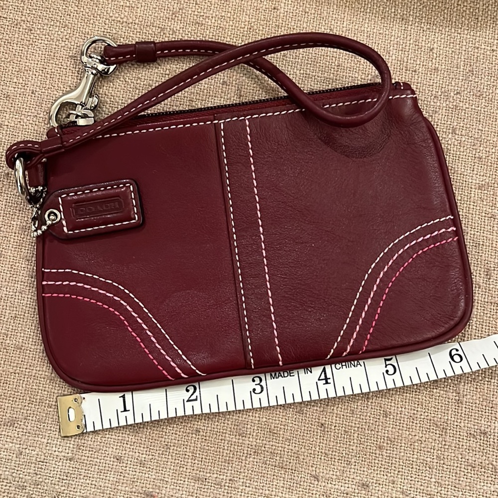 Authentic Coach wine wristlet with tri color stitching - Picture 4 of 4